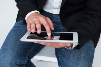 Person Using a Tablet